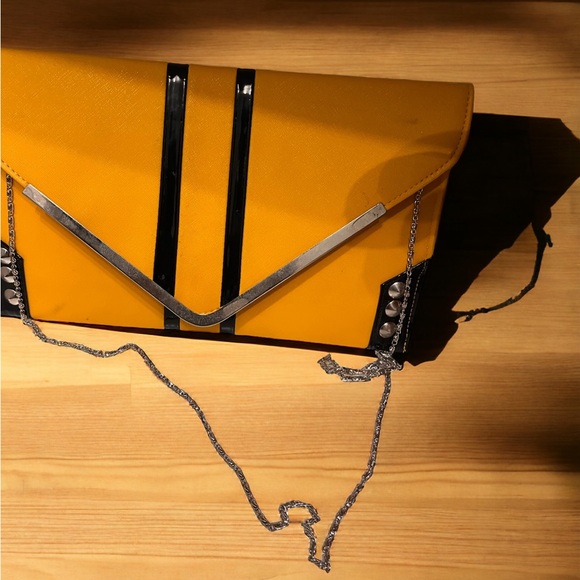 Across the shoulder or carry in your hand. - Picture 1 of 5